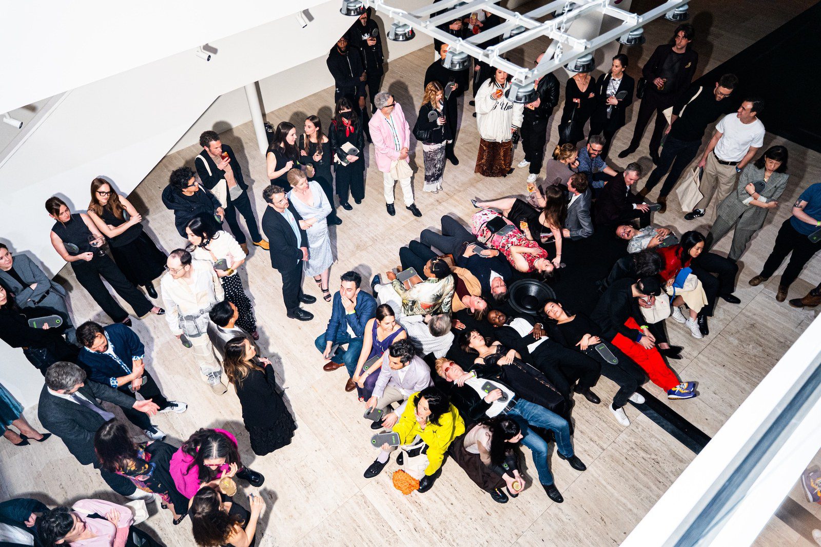 Installation view at a Rhizome benefit showing digital art on screens in a ballroom